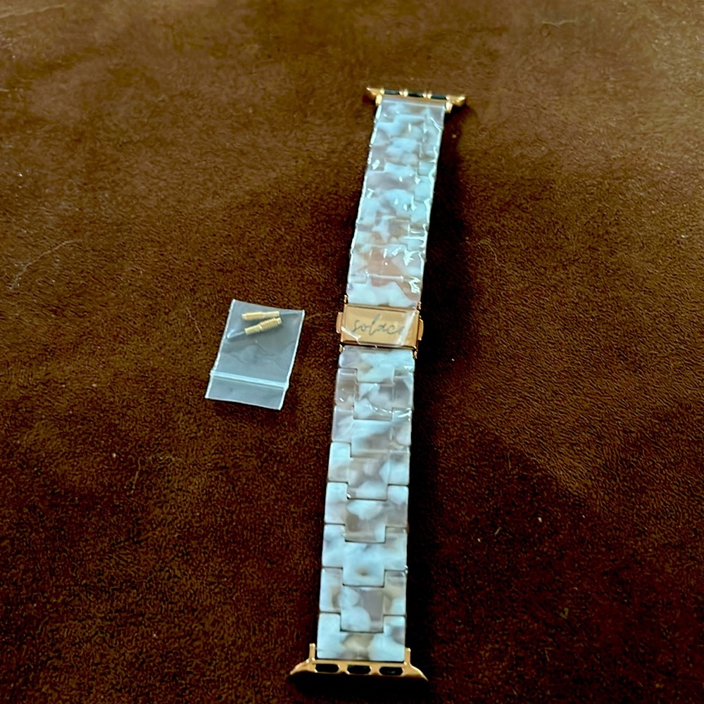 Brand new solace watch band. Includes screws to adjust.
